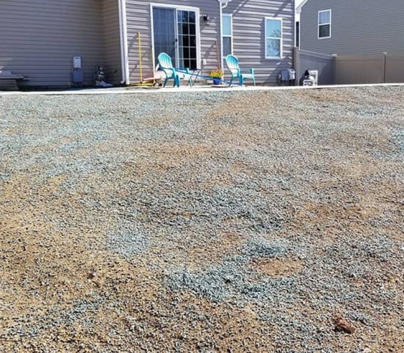 white home with clear lawn ready for lawn installation